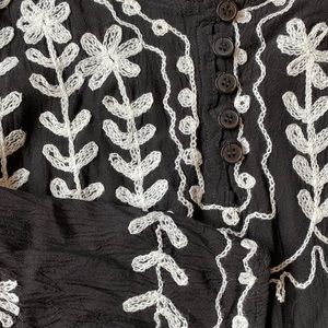 Exist brand light and airy dress or swimsuit cover up. Embroidered allover